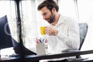 Businessman drinking coffee