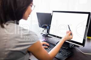 Woman watching her computer