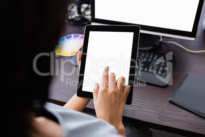 Woman watching her tablet computer