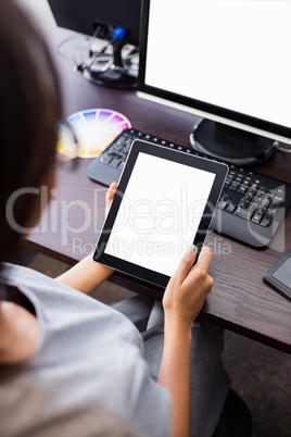 Woman watching her tablet computer