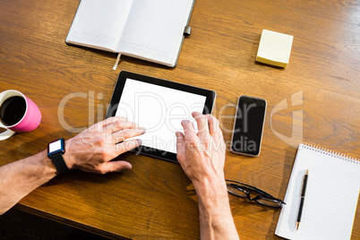 Businessman using tablet