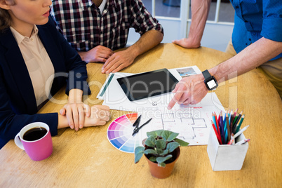 Businesspeople working together on a desk