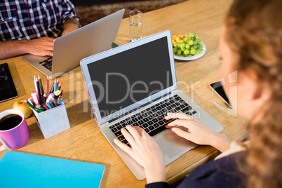 business woman working at computer desk