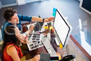 Colleagues using a graphic pad