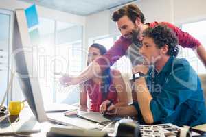 Colleagues using a graphic pad