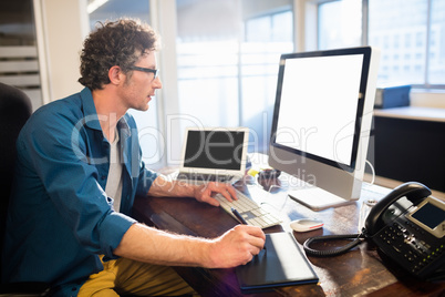 Businessman using a graphic pad