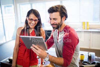 Colleagues using a tablet