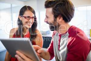 Colleagues using a tablet