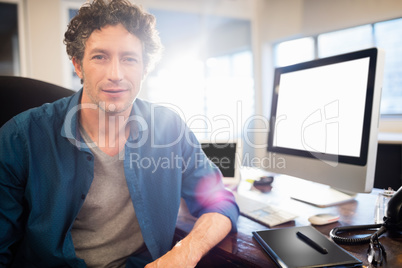 Businessman sitting on a swivel chair