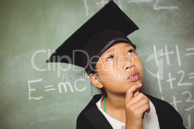 Schoolchild wearing a graduation outfit