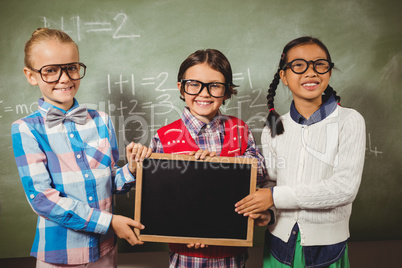 Children holding a blackboard