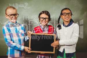 Children holding a blackboard