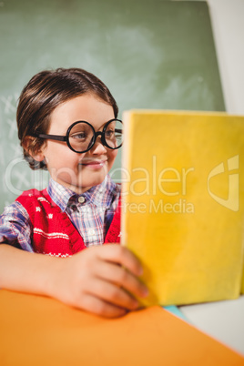 A little boy reading a book