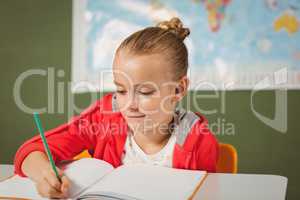 Girl writing in her notebook