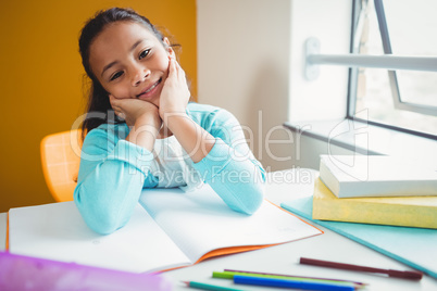 Girl sitting at a desk