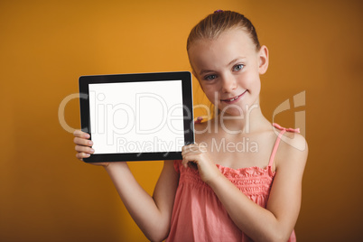 Girl holding a tablet Girl holding a tablet