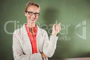 Teacher showing at blackboard