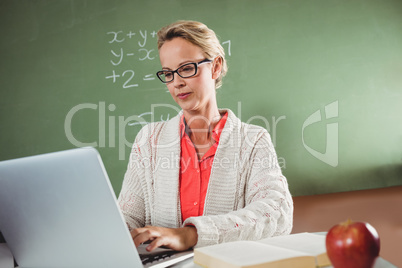 Teacher using a laptop