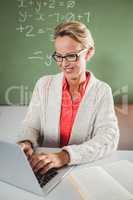 Teacher using a laptop