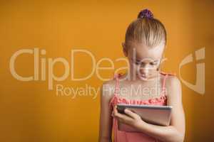 Little girl using a tablet