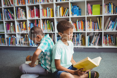 Little boys reading books