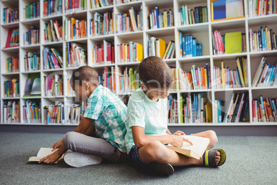 Little boys reading books