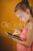 Little girl using a tablet