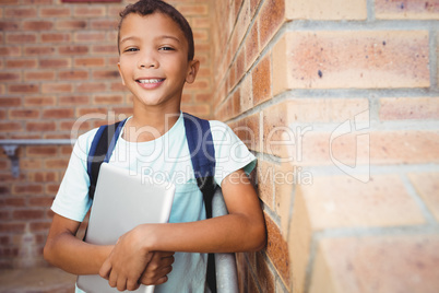 Smiling schoolboy looking at the camera
