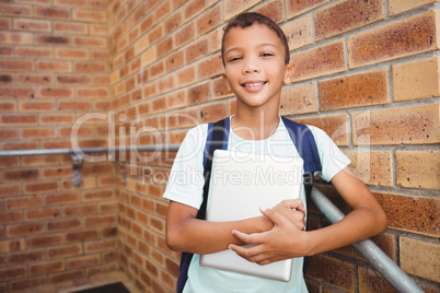 Smiling schoolboy looking at the camera