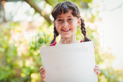 Girl holding a blank sign