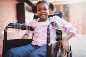 Girl siting in a wheelchair