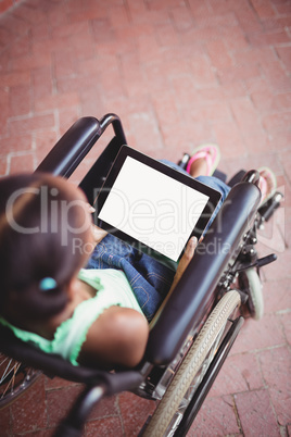 Top view of a girl siting in a wheelchair