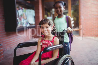 Girl seated on a wheelchair