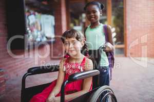 Girl seated on a wheelchair