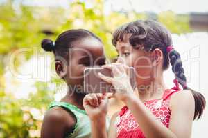 Two girls with a smartphone