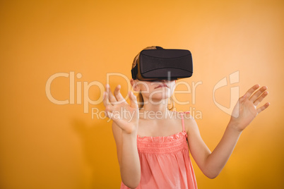 Little girl wearing virtual reality glasses