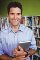 Portrait of a men holding a book