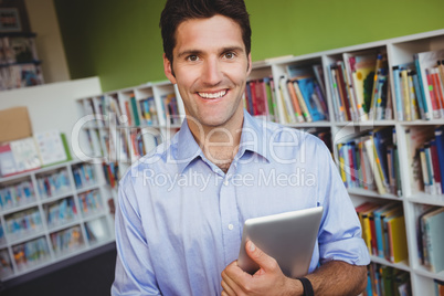 Portrait of a men holding a book