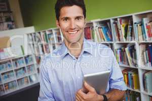 Portrait of a men holding a book