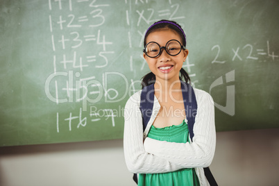 Standing schoolgirl looking at the camera