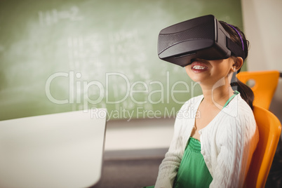 Seated girl wearing virtual reality glasses