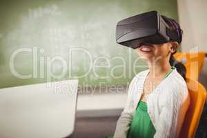 Seated girl wearing virtual reality glasses