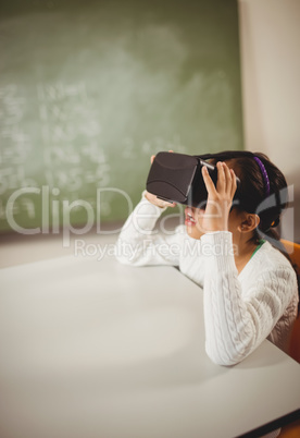 Little girl using virtual reality glasses
