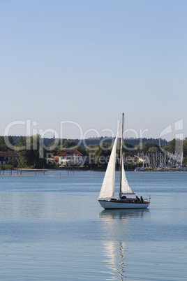 Sailing boat at lake Chiemsee, Bavaria, Germany