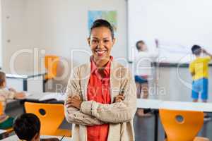 A smiling teacher posing for the camera