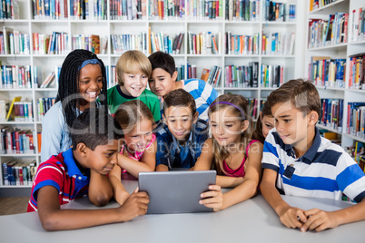 Front view of pupils using tablet pc