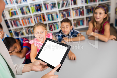 Close up view of a tablet hold by a teacher