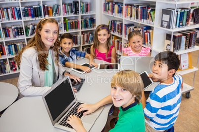 Teacher posing with her students