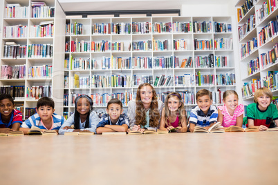 Teacher reading books to her students