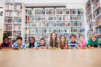 Teacher reading books to her students